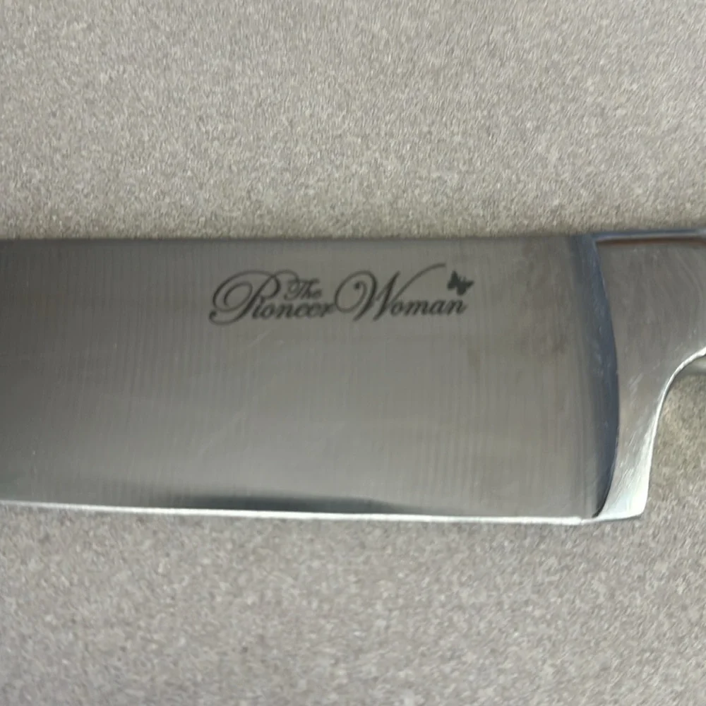 Pioneer Woman 8 in knife with Turquoise handle in good used condition